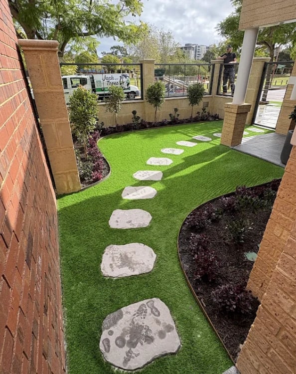 Artificial turf installation with stepping stones